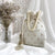 Myra Off White Potli